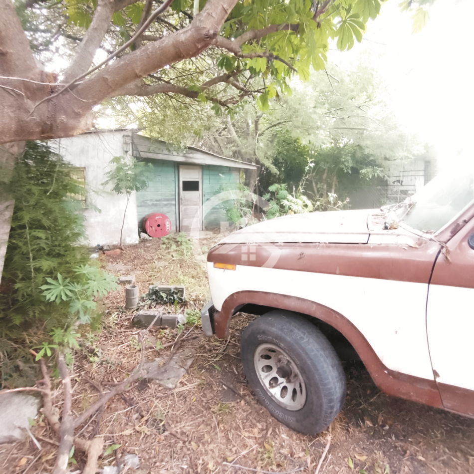 TERRENO CON CASA