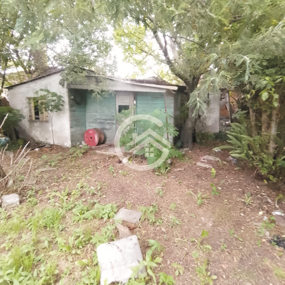 TERRENO CON CASA