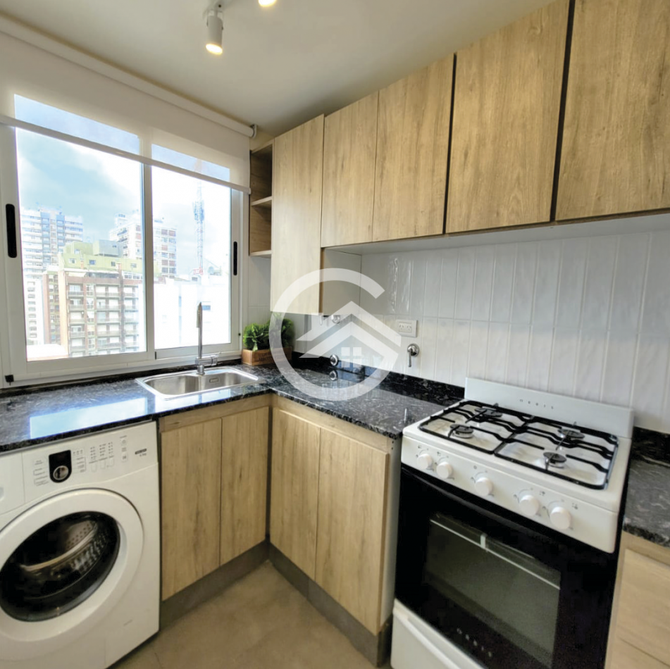 Depto 2 ambientes con balcon, terraza y cochera. Plaza Colon 